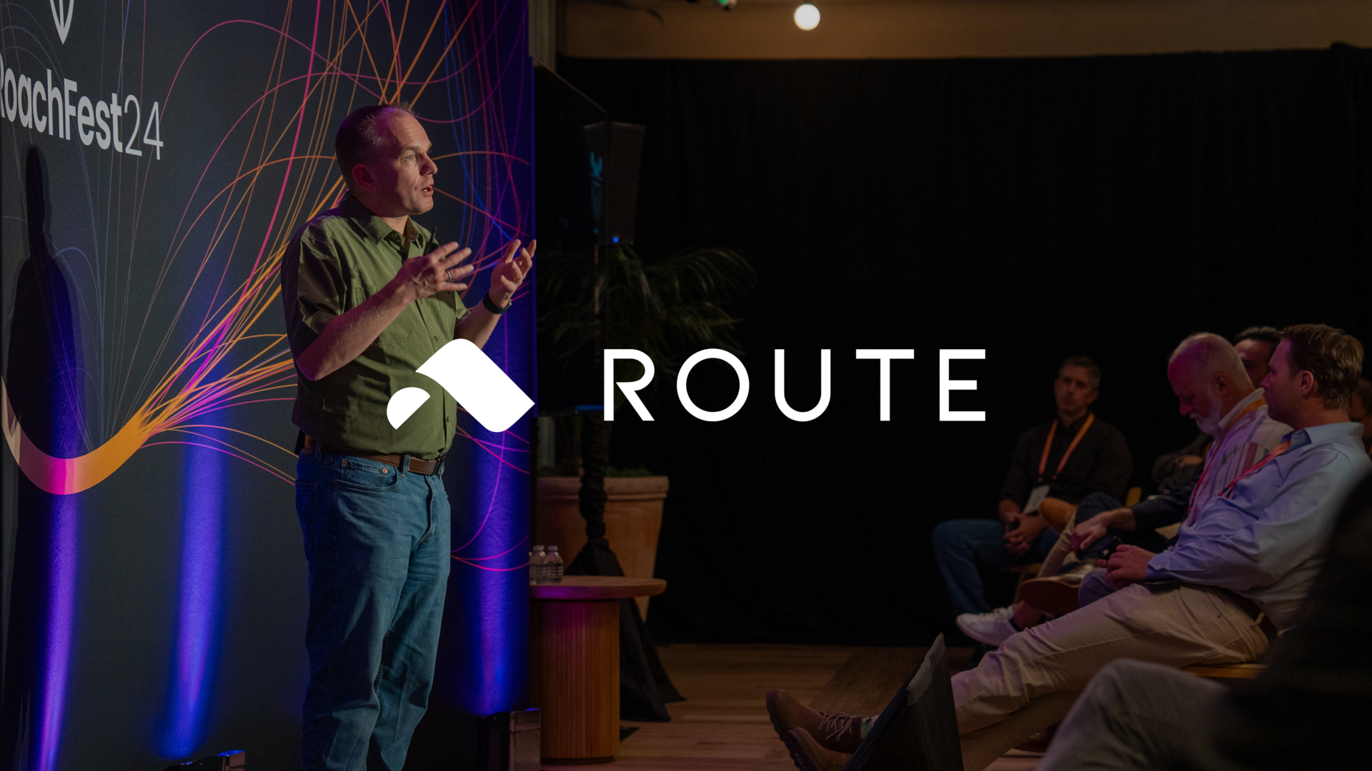 An image of Bryan Call of Route presenting at RoachFest 2024.