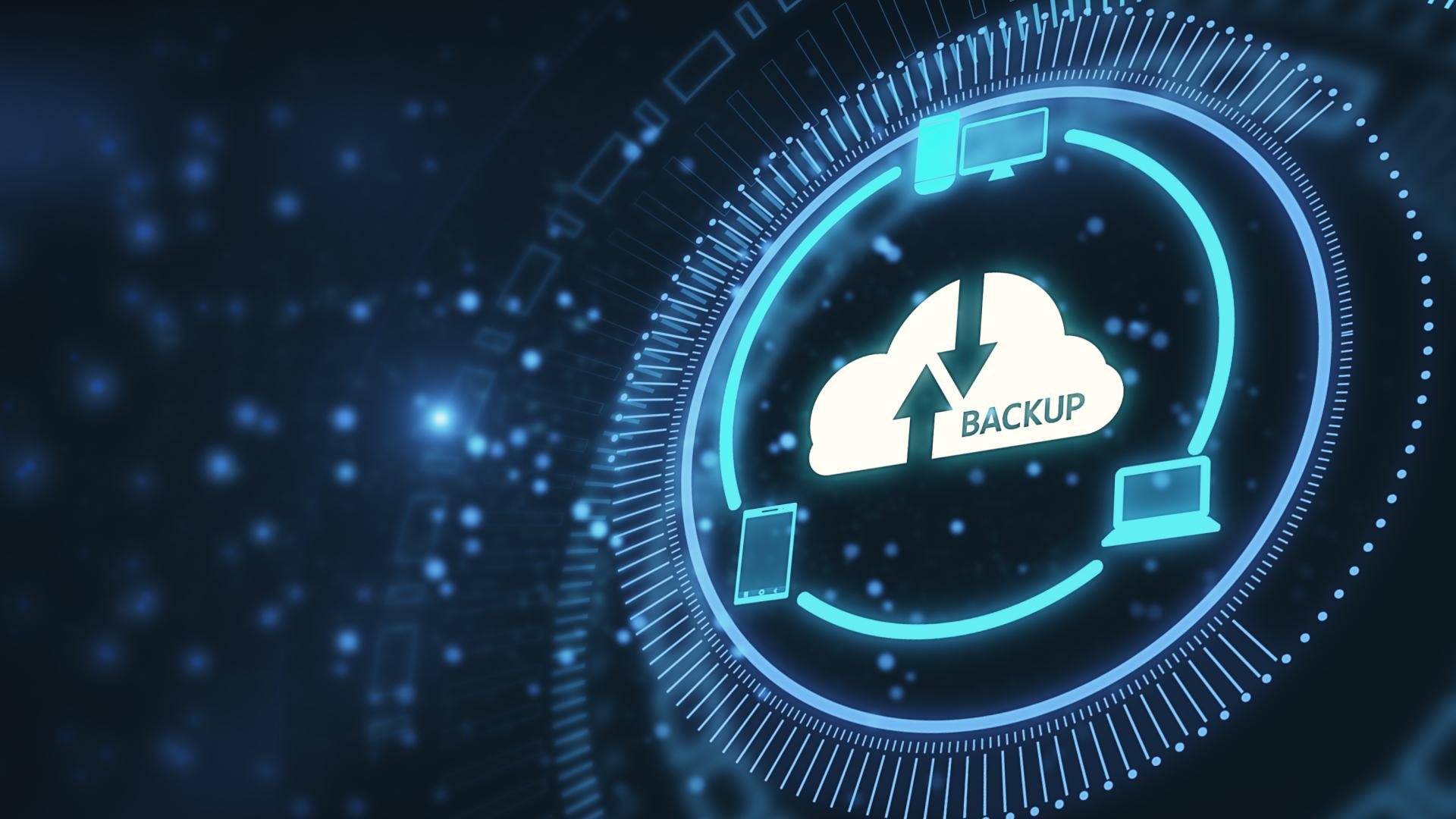 A high tech circular image with a cloud in the center that says "Backup."
