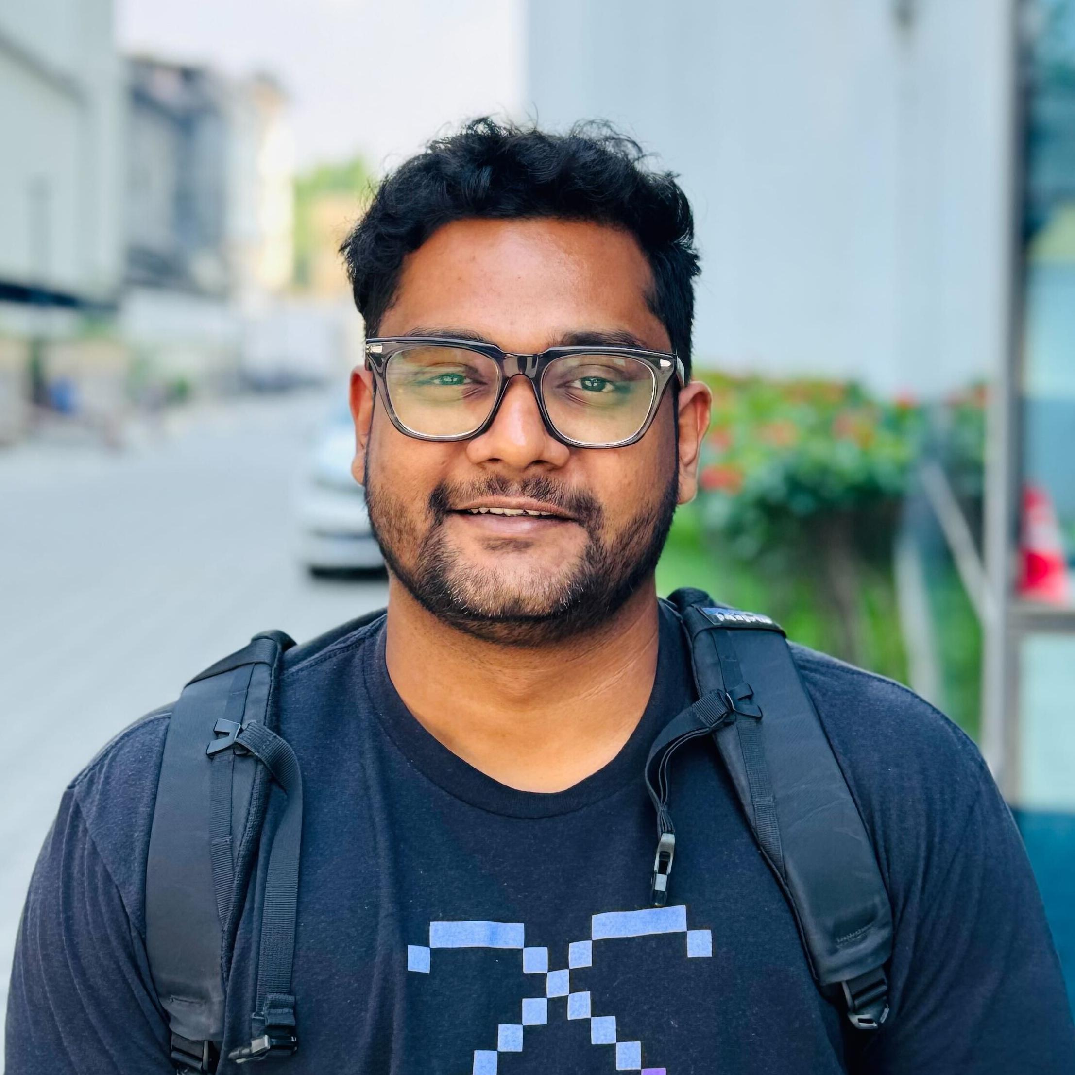 A photo of Ayog Mohanty, Senior Compliance Analyst at Cockroach Labs.